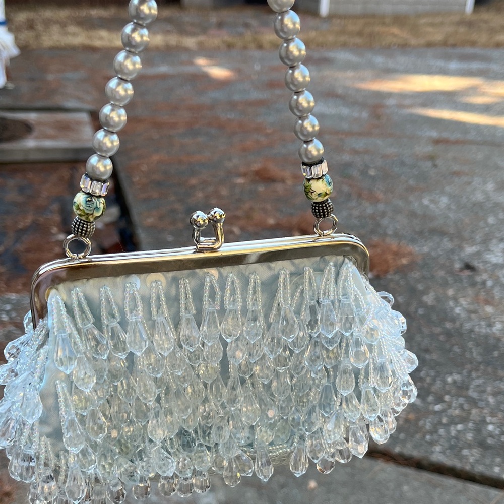 Elegant Beaded Handbag with Silver Accents